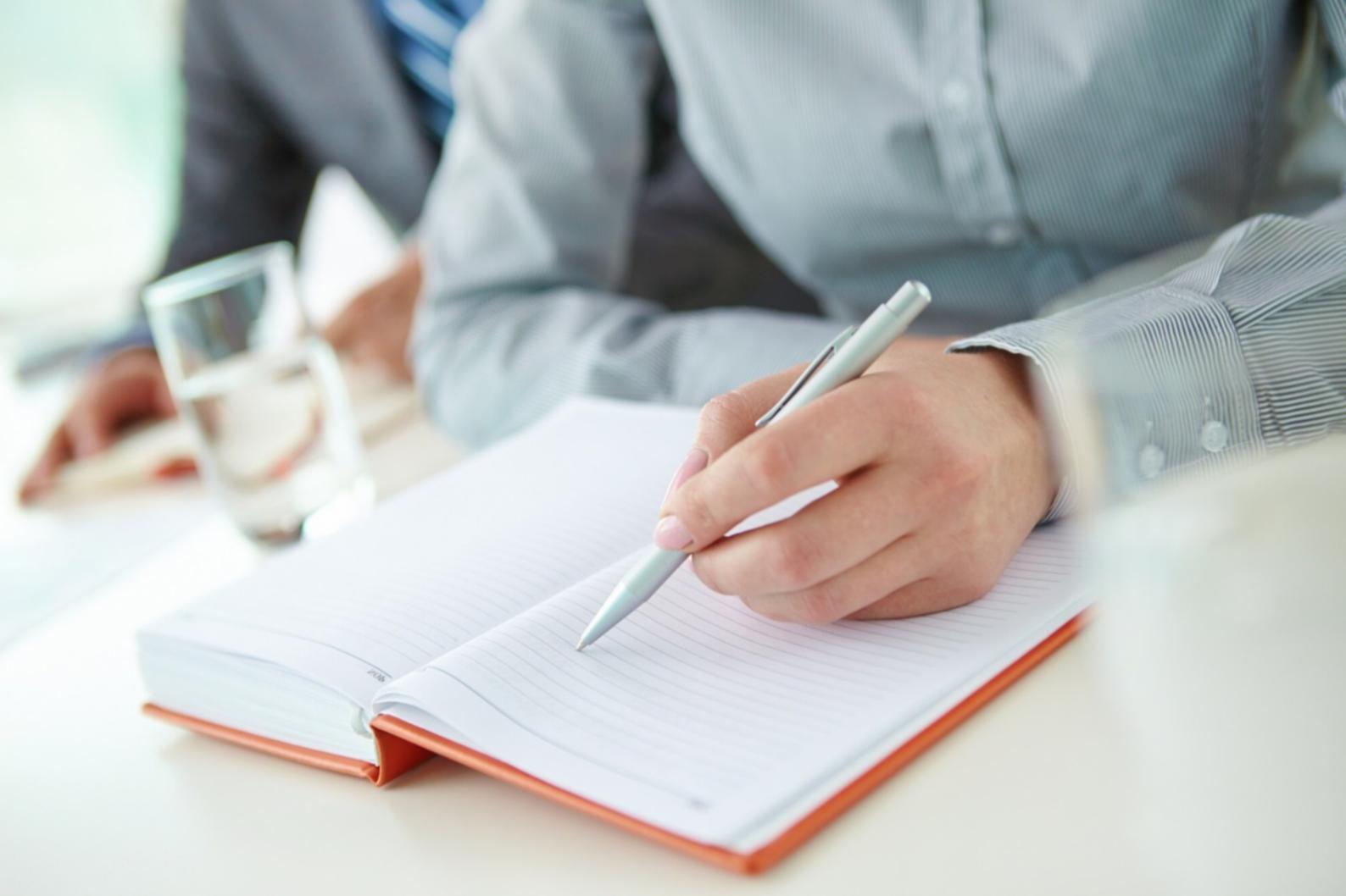 Business professionals analyzing financial forecasting data and charts